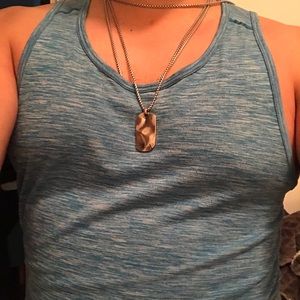 Men’s sterling silver chain with pendant.